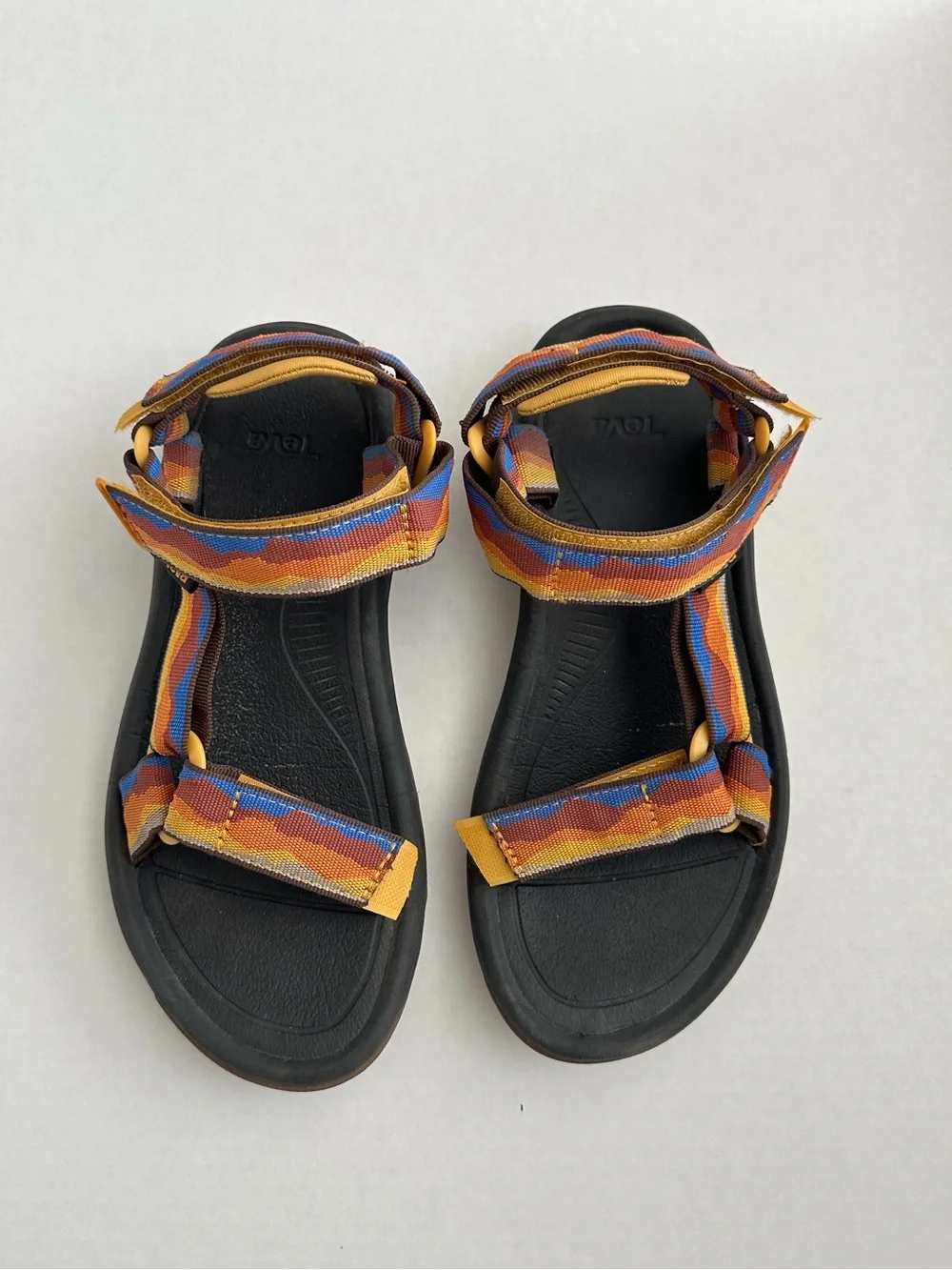 Men’s Teva Black Sandals with Yellow and Blue Straps